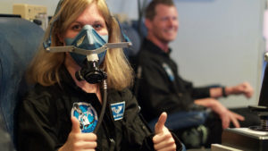 Dr. Ulyana Horodyskyj and Callum Wallach are exposed to hypoxic conditions in simulated flight. (credit: Ross Lockwood)